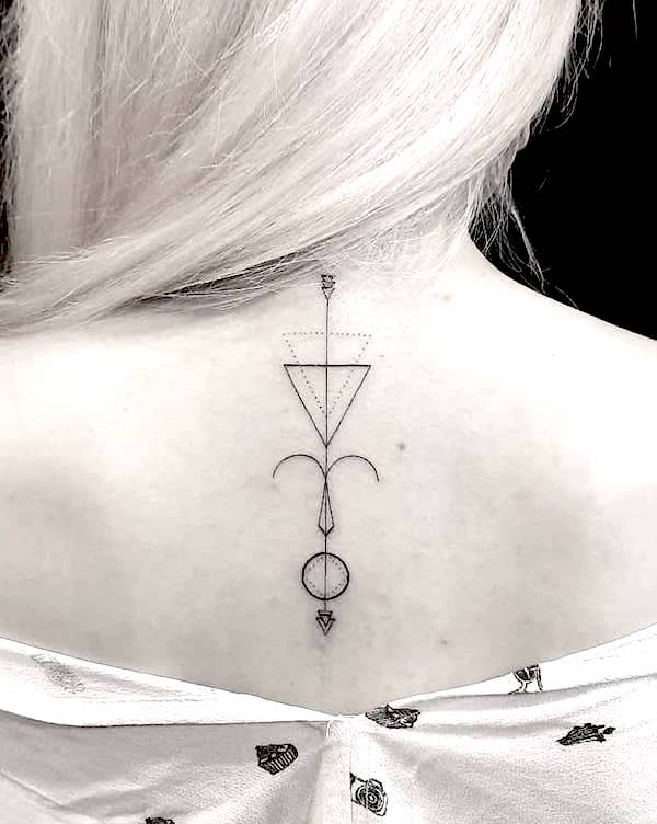 Geometric symbol nape tattoo for Aries by @arnaz_disaster