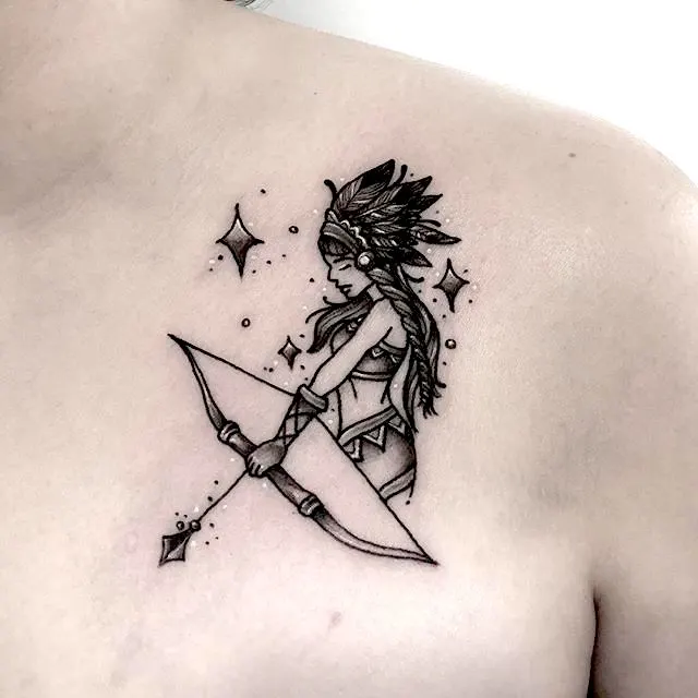 A glittering archer chest tattoo by @amandacreek