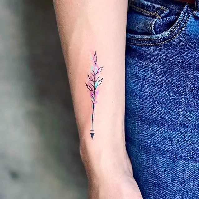 A minimalist arrow tattoo on the wrist by @nothingwildtattoo