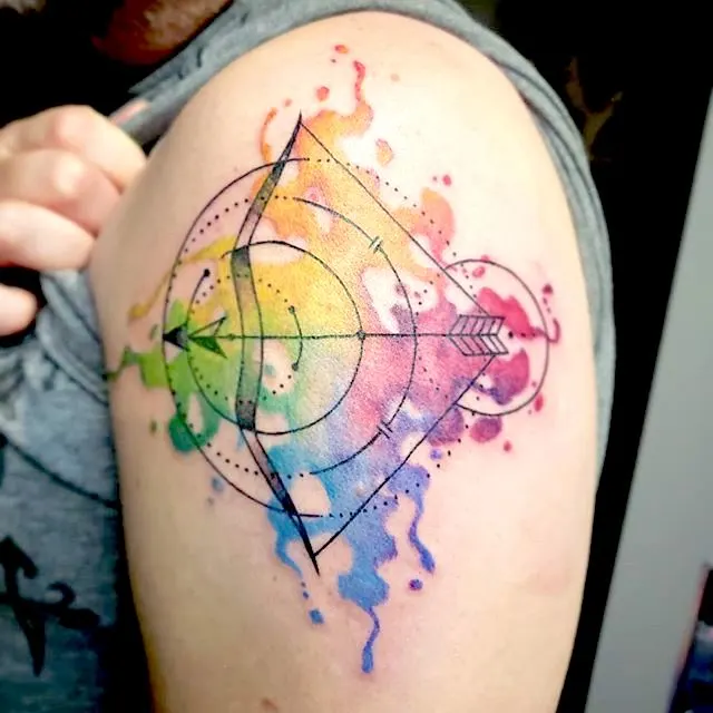A stunning watercolor shoulder blade tattoo by @ryanbrayart