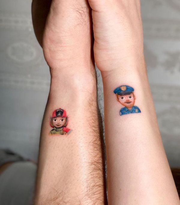 Emoji tattoos for police and firefighter couple by @sinners.cvlt_.tattoo