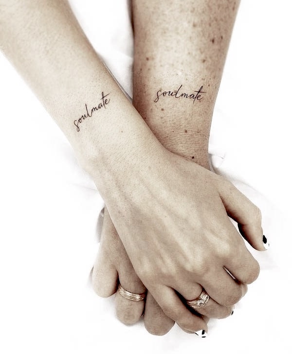 Soulmate script wrist tattoos by @coupletattoo_palma