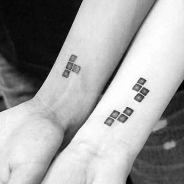 Tetris matching tattoos by @cerimonial_dezaleon