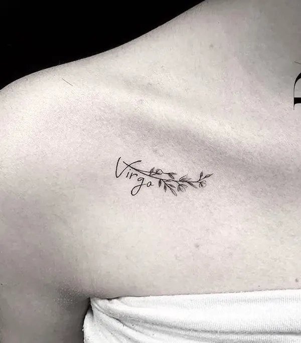 small Virgo tattoo under the collarbone by @dreamworxink