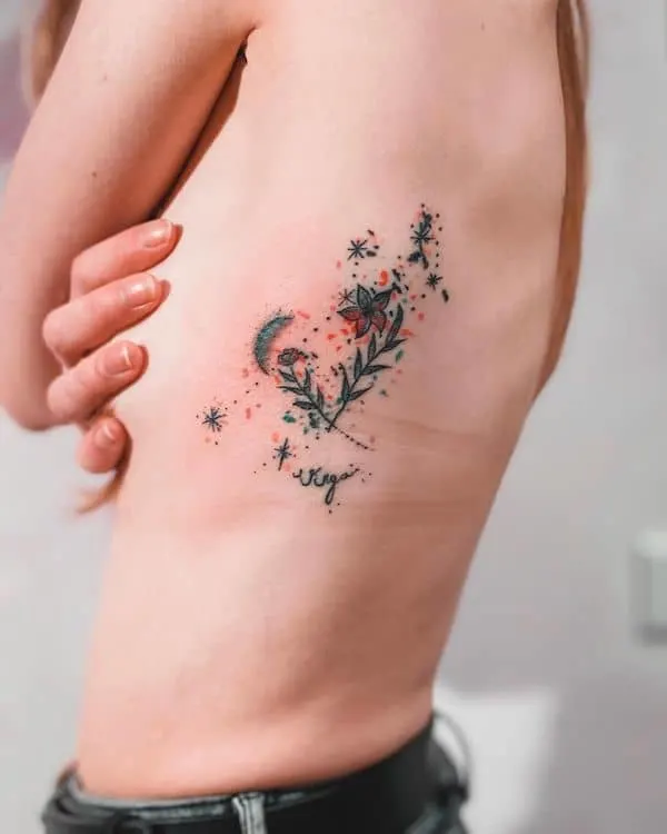 A floral Virgo constellation rib tattoo from @santoro.noe   - Unique tattoo ideas for Virgo women