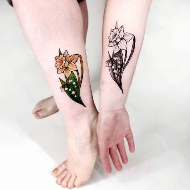 Matching daffodil tattoos on arm and leg @tiffleetattoo