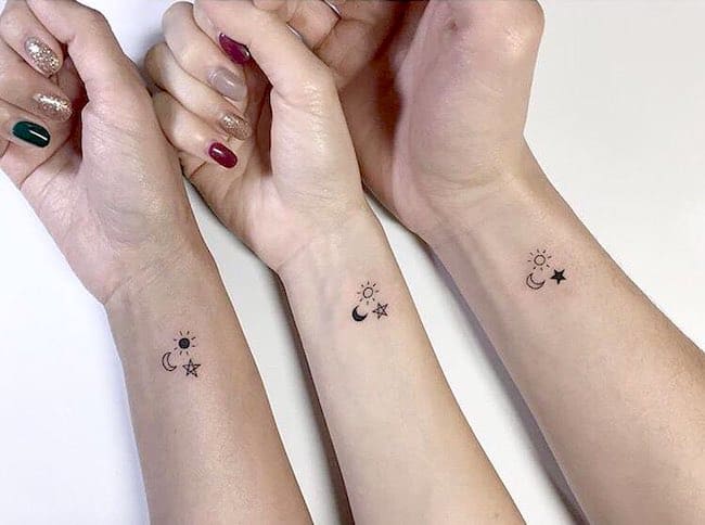 Small friendship wrist tattoos for 3 by @playground_tat2