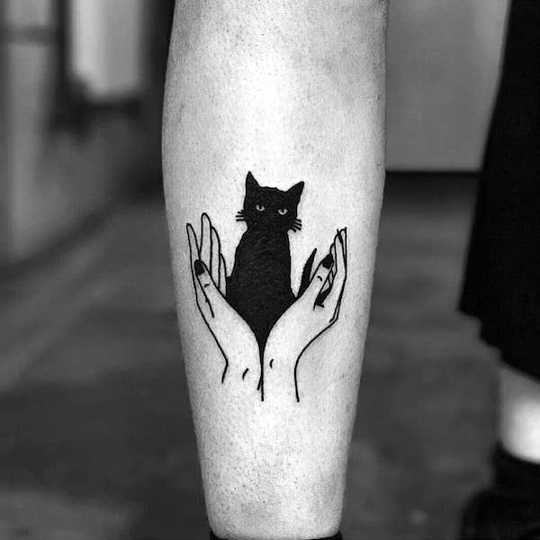 A black cat tattoo by @demondance- The Familiar animals tattoos for witches
