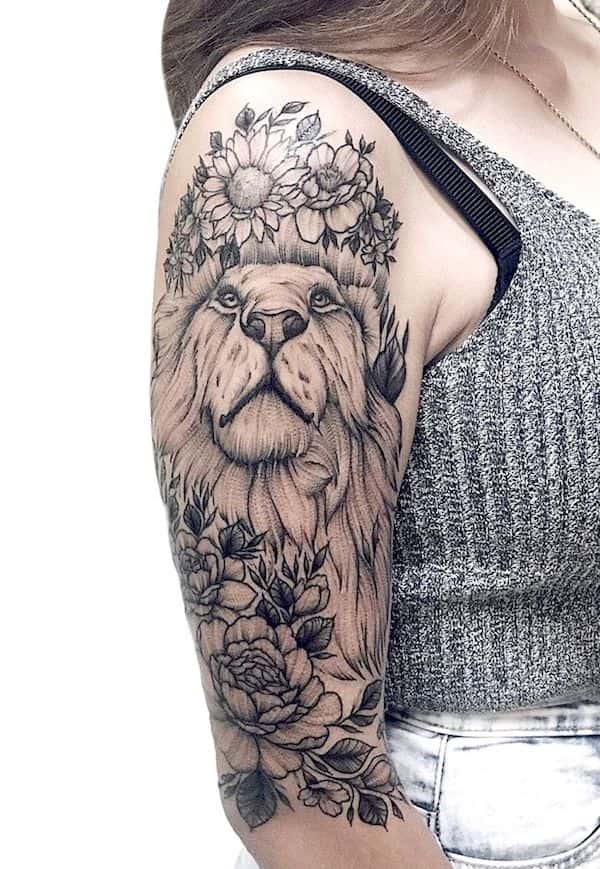 A bold full sleeve Lion tattoo by @annakust_tattoo- Unique Leo tattoos for women