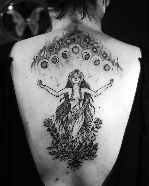 A moon phase fantasy tattoo on the back by @carolynn__h- Witch tattoos and meanings