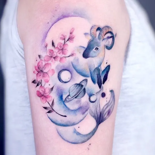 A cute watercolor Sea-Goat sleeve tattoo by @doggy_tattooist