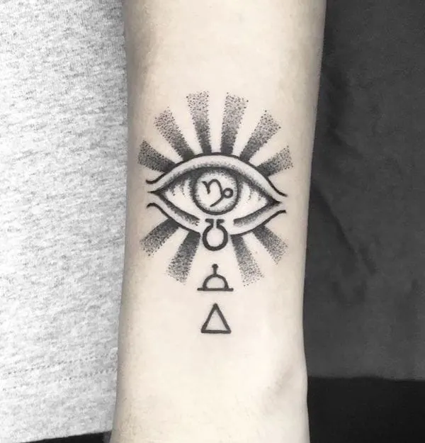A glowing Capricorn glyph tattoo by @janshuen
