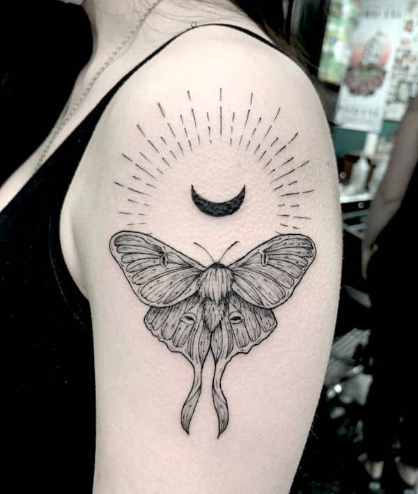 The black moth tattoo by @juanlooneyrojas- The Familiar animals tattoos for witches