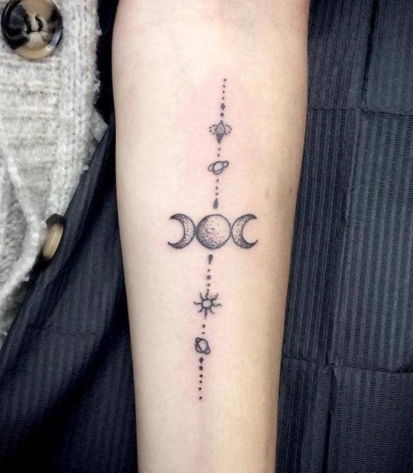 A symbolic Triple Moon forearm tattoo by @nuriafortunytattoo- Wicca symbol tattoos