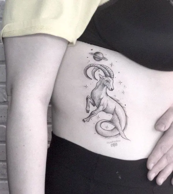 A rib tattoo for Capricorn by @plathtattoo