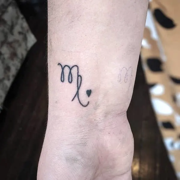 A small Virgo symbol wrist tattoo by @shwhatevz -Virgo sign symbol and constellation tattoos