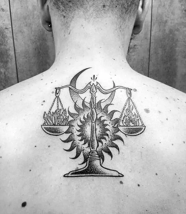 Fire and ice by @snuka.tattoo - Bold Libra tattoo ideas for men