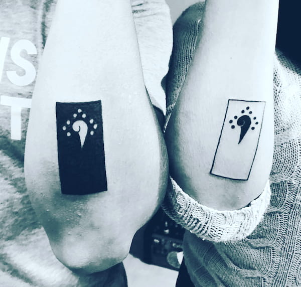 Black and white symbolic elbow tattoos by @coach_eder_torres- Bold and creative tattoos for brothers