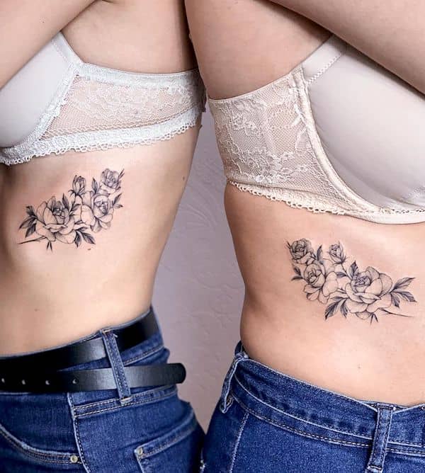 Floral rib cage tattoos by @d_ratajczyk - Meaningful tattoos for sisters
