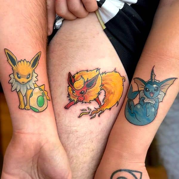 Pokémon sibling tattoos for 3 by @andreastelltn- Stunning unisex matching tattoos for siblings