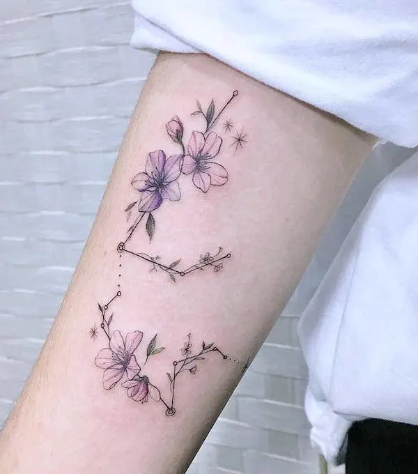 A floral Aquarius constellation tattoo by @tattoosphera