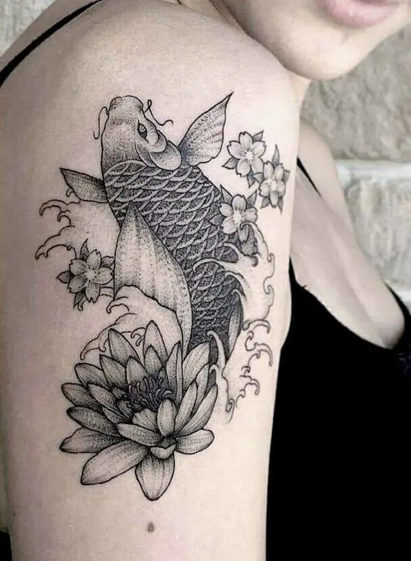 An intricate fish and water lily sleeve tattoo - Pisces symbol and constellation tattoos