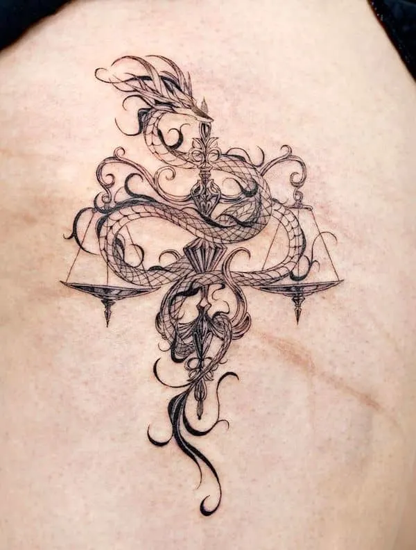 An intricate dragon tattoo for Libra men by @bium_tattoo - Bold Libra tattoo ideas for men