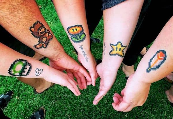 Super Mario sibling tattoos for 5 by @adri.c.walker- Stunning unisex matching tattoos for siblings