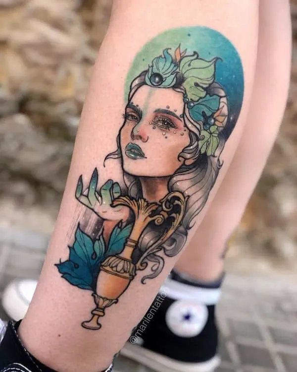 A realistic leg portrait tattoo by @marilentattoo