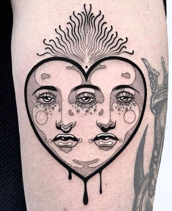Twin heart blackwork tattoo by @sararosacorazon.art- Unique Gemini tattoos for men
