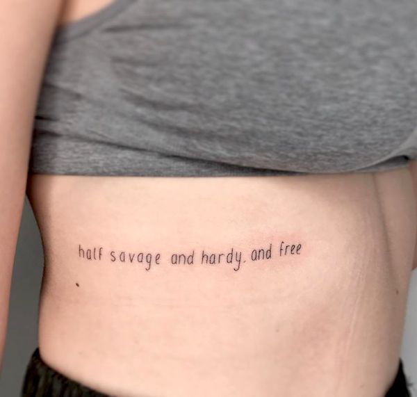 "Half savage and hardy and free." - a rib tattoo to announce your attitude by @sticks.not.stones