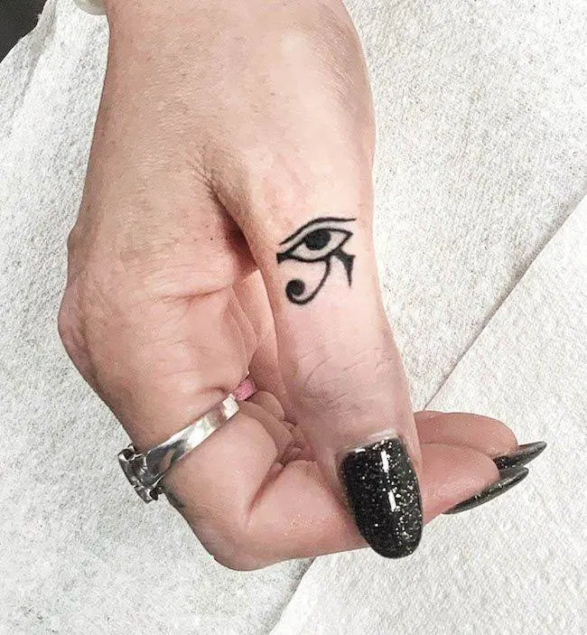 The Eye of Horus thumb tattoo by @sara_scribbles- Creative thumb tattoos