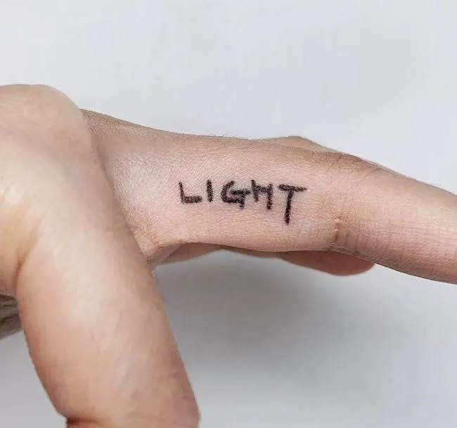 A minimalist lettering tattoo on the inner finger by @soseul_tt- Dainty finger tattoo ideas