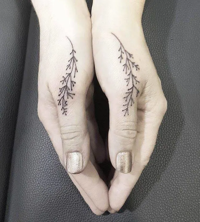 Plant tattoos on both thumbs by @tattoosbyeloise- Creative thumb tattoos