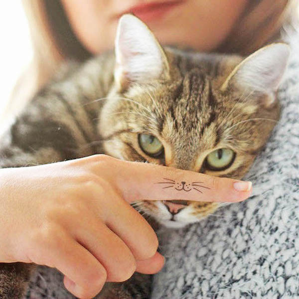 A little cat snout finger tattoo by @_tattooforaweek_- Minimalist tattoos for cat lovers