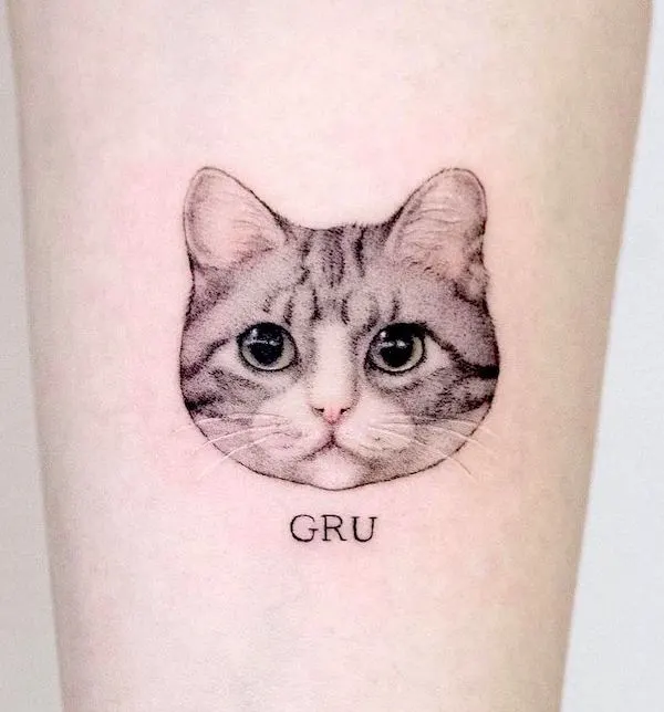 A realistic cat tattoo by @mini_tattooer