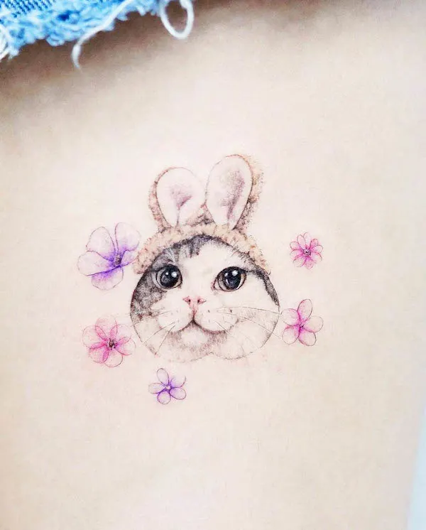 The cat bunny watercolor tattoo by @mini_tattooer- Stunning realistic cat tattoos