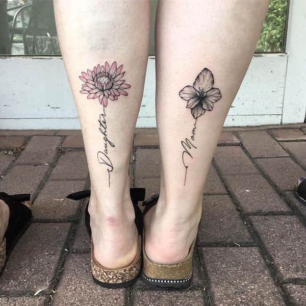 Chrysanthemum and gladioli leg tattoos by @@annabel.ink_