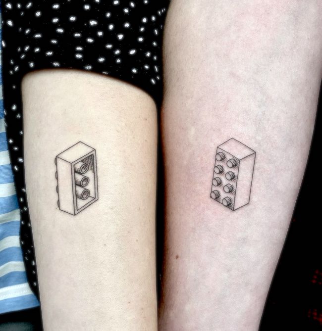 Cute matching lego tattoo by @_mfox