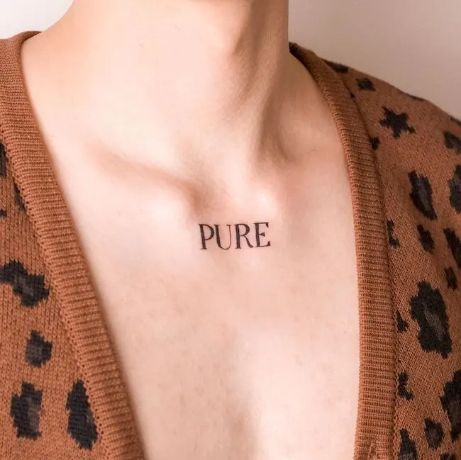 A pure soul - a single-word tattoo by @fawn.ink