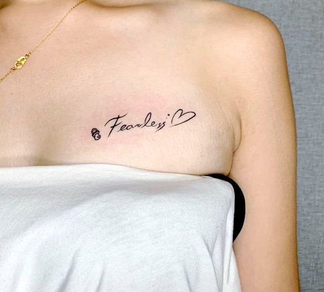 Fearless - beautiful script tattoo by @junhan_tattoo