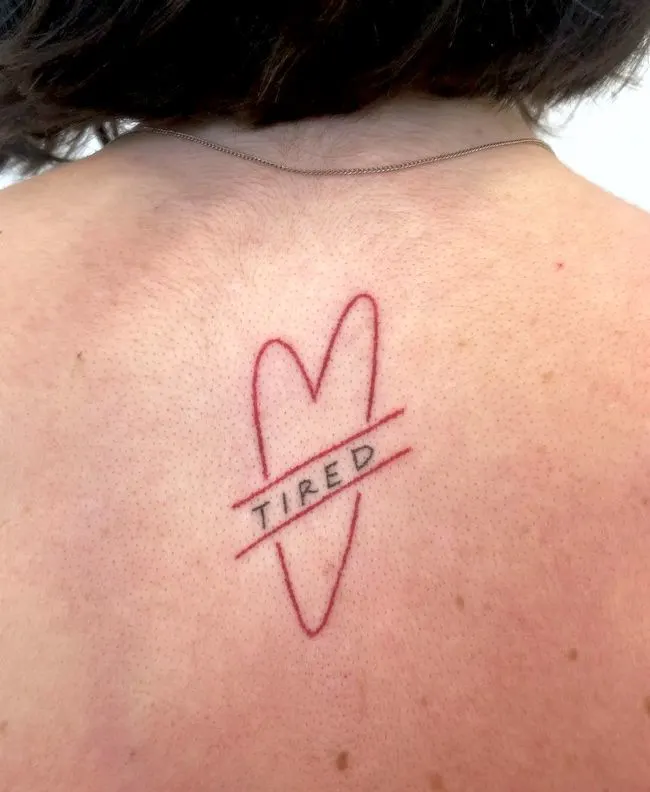 Tired - one-word tattoo by @katememphis