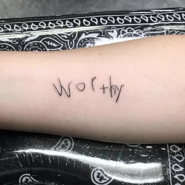 Worthy - an inspiring self-love tattoo by @lu_tattoos