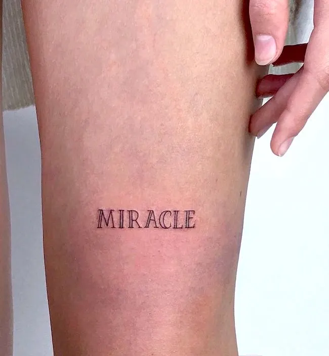 Miracle - inspiring one-word tattoo by @marinezzo