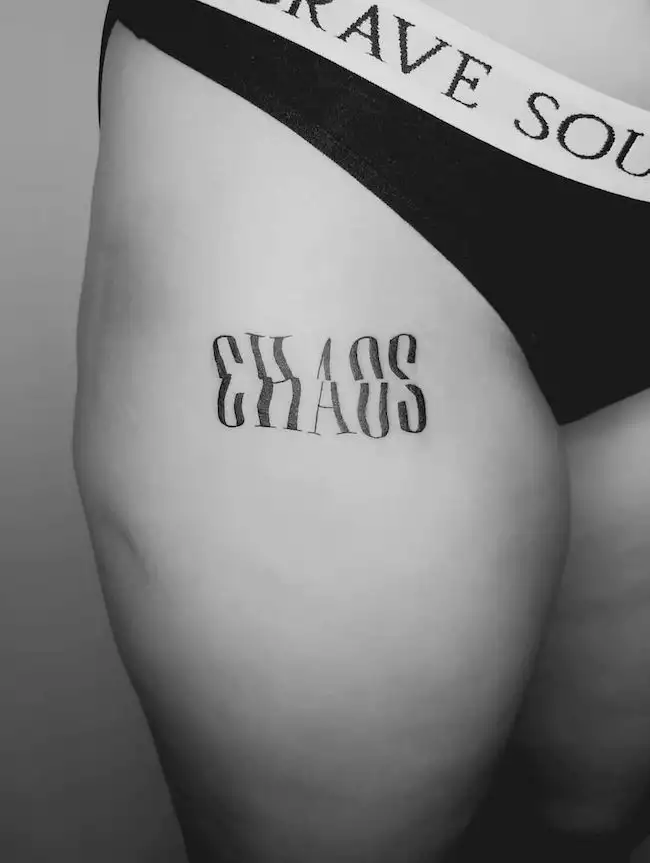 Chaos - unique one-word tattoo by @math.lst
