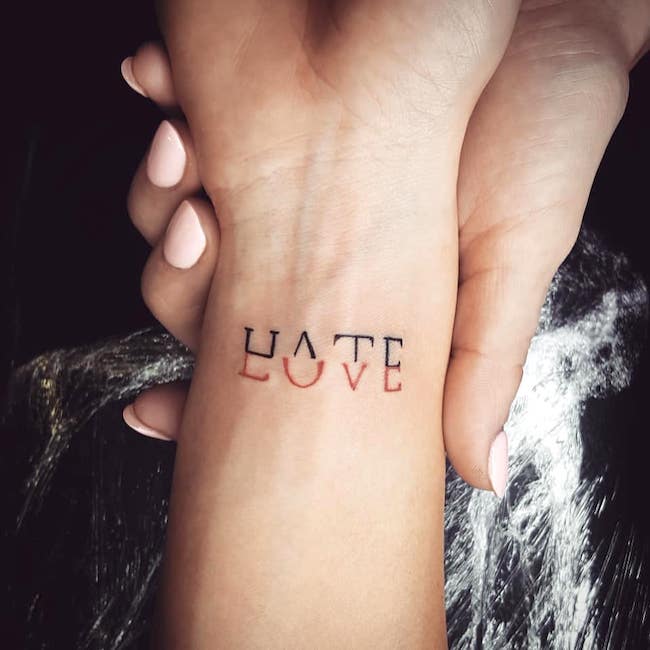 Love and hate - creative one-word tattoo by @moninktattoosluxembourg