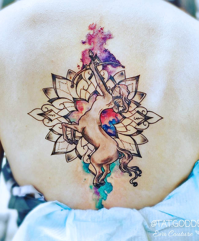 A watercolor archer tattoo by @tat.goddess