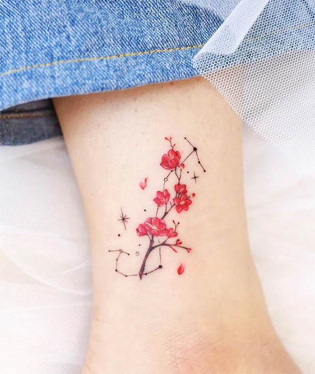Scorpion and apricot flower - Scorpio tattoo by @xiso_ink