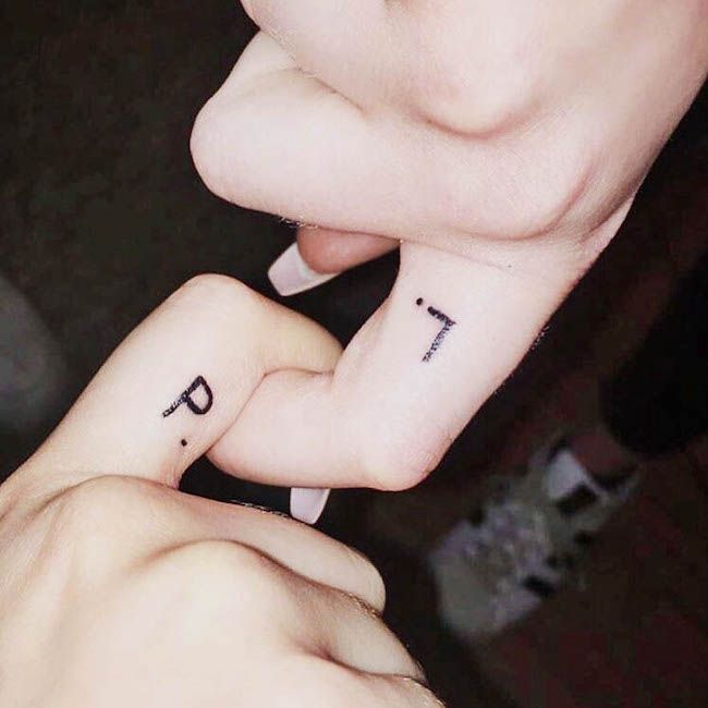 Initial finger tattoos by @xoxo.lucia- Minimalist tattoos for couples 