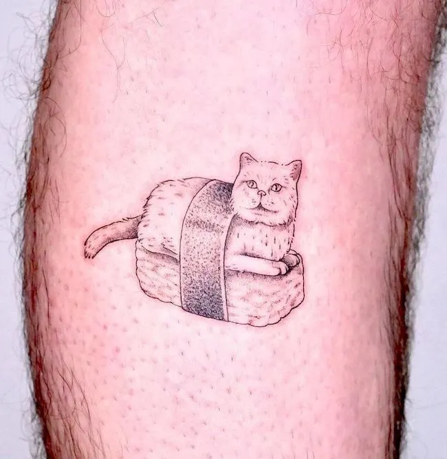 A creative cat sushi tattoo by @pt78tattoo
